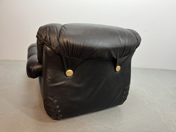 Image 1 of Beautiful Big Black Leather Postmodern Italian Design Space Age Lounge Chair with Brass Buttons and Playful Cord Lacing, 1970s.