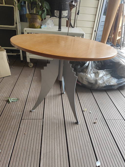 Design side table with rotating top metal base