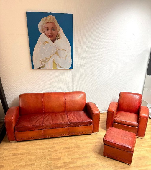 Brocantique Jacques Adnet Art Deco Set: Leren bank, fauteuil en poef