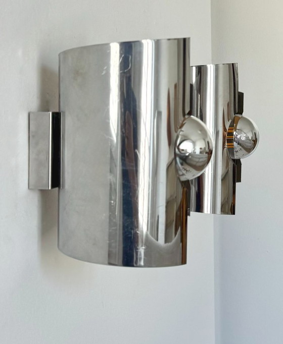Image 1 of Pair of vintage wall lights, curved chrome-plated metal, France, 1970