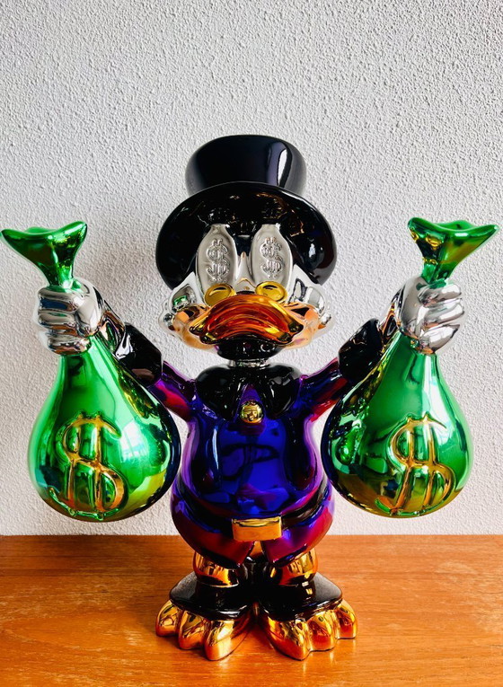 Image 1 of Dagobert Pato obra de arte dinero escultura única LV Información: * Nuevo * Altura: 40 cm. * Anchura: 32 cm.