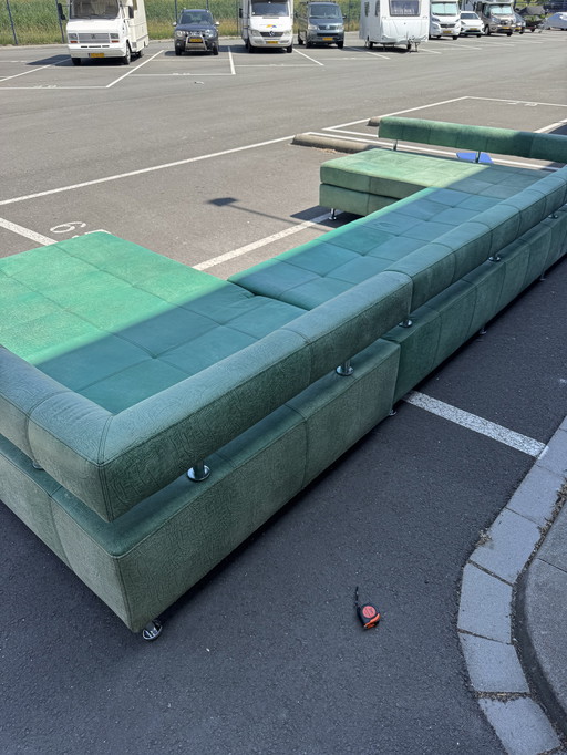 Mega Alcantara corner sofa by DeSede.