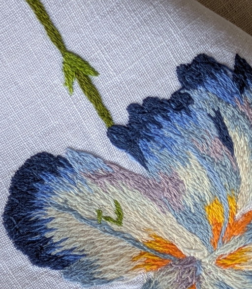 Set and matching napkin with Iris motif attributed to D. Porthault