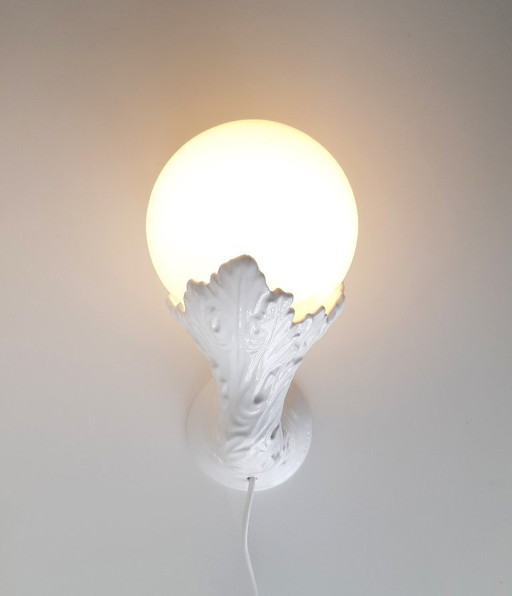 Sculptural porcelain wall lamp, ceramic leaves with glass bulb lamp