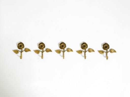 Set of five beautiful, solid mid-century brass rose wall coat hooks
