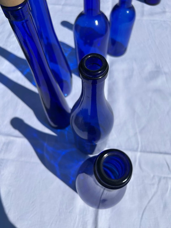 Image 1 of Set van 6 kobaltblauwe glazen flessen/vazen/vintage blauwe decoraties