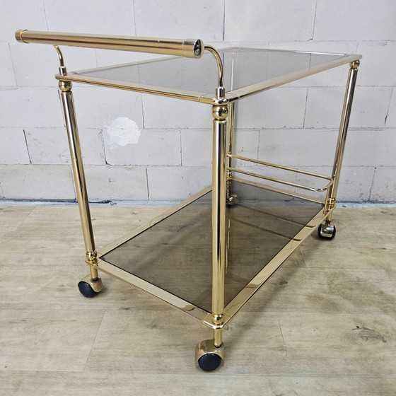 Vintage golden brass bar cart / trolley smoked glass shelves (photo 4 of 15)