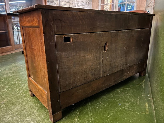 Image 1 of A very small rustic walnut sideboard