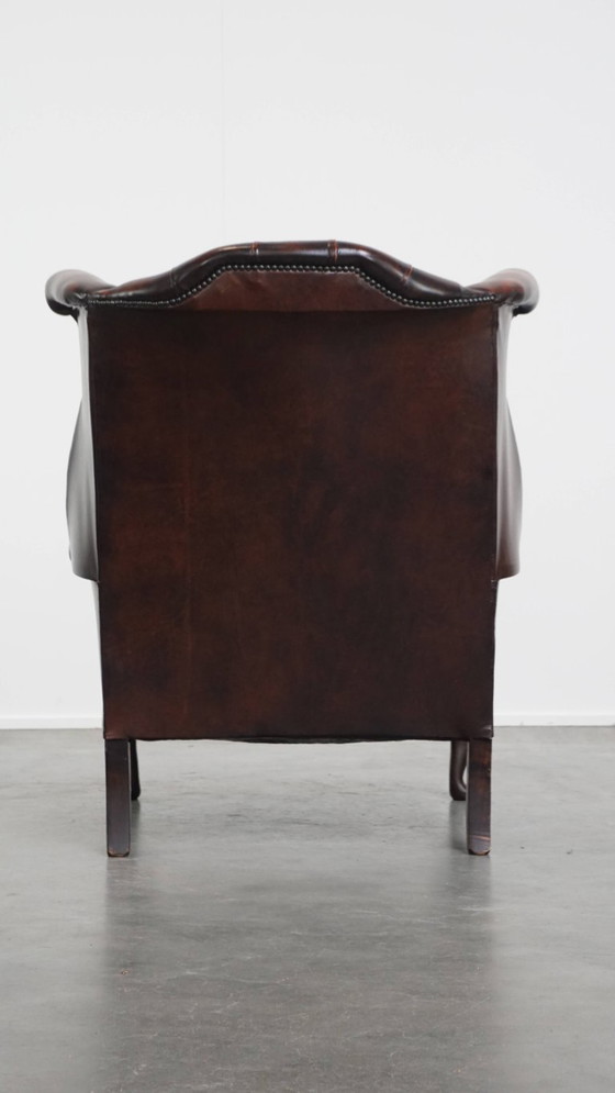 Image 1 of Bruine rundleren chesterfield oorfauteuil