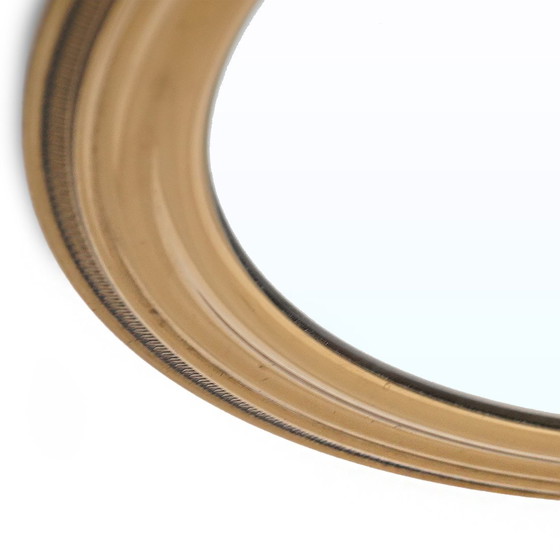 Image 1 of Specchio rotondo in ottone montato a parete, anni '50