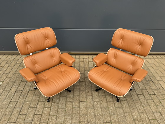 Image 1 of 2 poltrone lounge Vitra Eames XL originali con poggiapiedi, in pregiata pelle color cognac e palissandro Santos, NUOVE!!