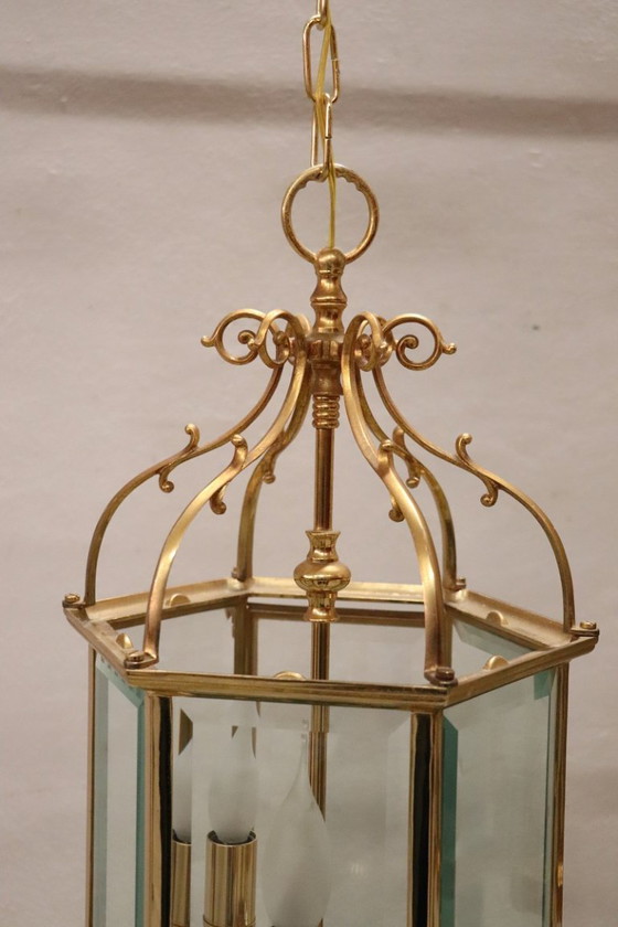 Image 1 of Een paar vintage lantaarns van verguld metaal en glas.