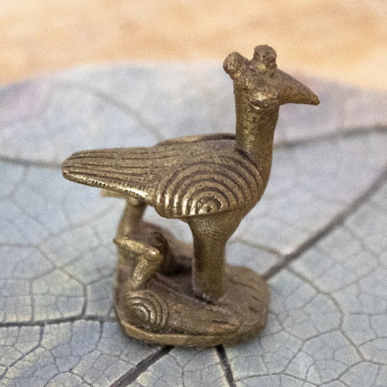 Image 1 of Peso per bilancia antico in ottone, serpentario africano con pulcini