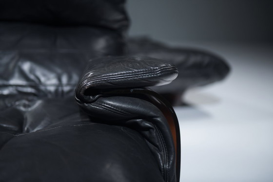 Image 1 of Rara poltrona e pouf Marsala in pelle nera - Michel Ducaroy - Ligne Roset