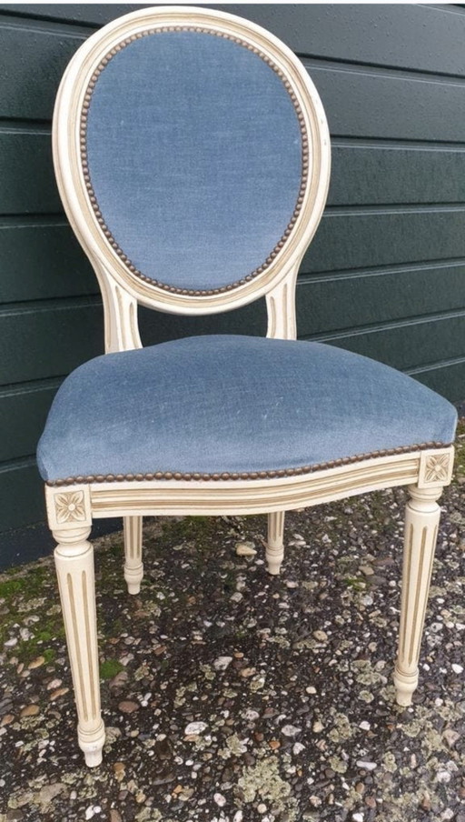 4 chaises de salle à manger à médaillon
