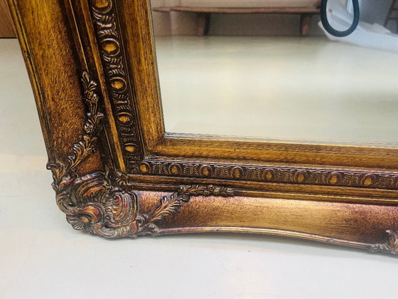 Image 1 of Großer, antiker Spiegel mit geschnitztem, goldgerahmtem Rahmen