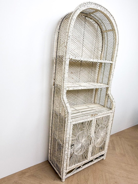 Image 1 of Vintage rattan wicker arch cabinet with sunflower motif