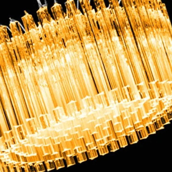 Image 1 of Lustre Triedro « Concava » italien de style moderne du milieu du siècle, en ambre.