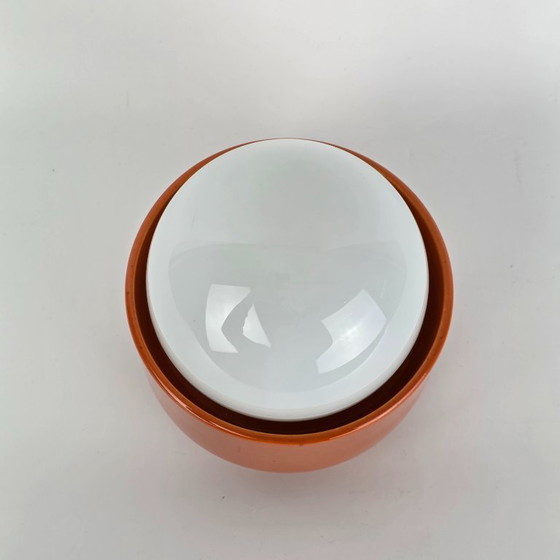 Image 1 of Vintage German ceramic lamp with a glass globe shade. Can be used as a wall lamp, table lamp, or sconce. Orange. 70s / retro