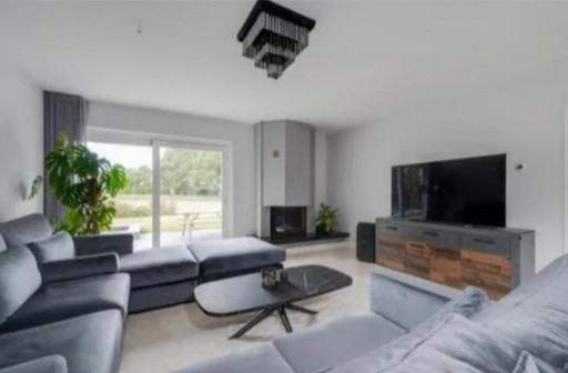 Lujoso sofá esquinero + otomana