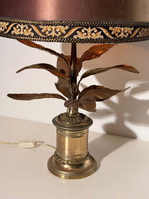 Willy Daro tafellamp met sculpturale bladvoet.