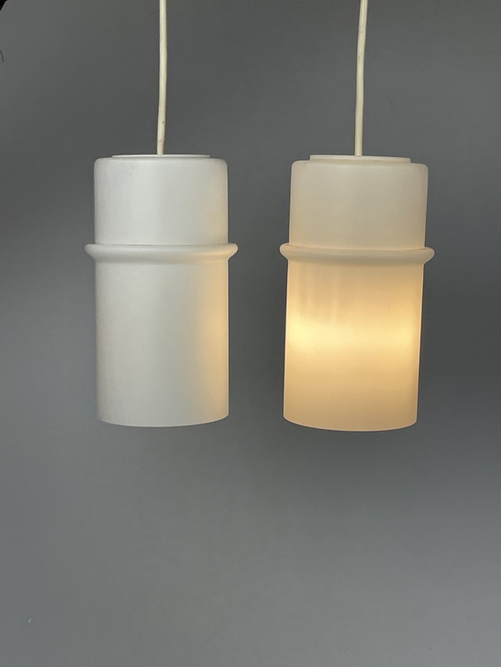 Image 1 of Set van Twee Melkglazen Hanglampen, Raak, Nederland, 1960's