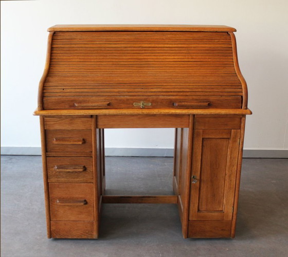 Image 1 of Amerikaans bureau van licht eikenhout, eind 19e eeuw.