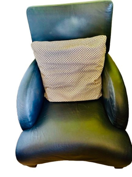 Image 1 of Designfauteuil "Oriente" + voetenbank