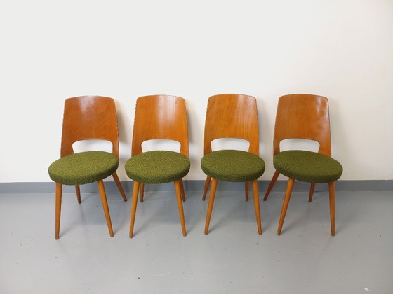 Image 1 of Set van 4 vintage Mondor stoelen van Baumann in hout en bouclé stof uit de jaren 60