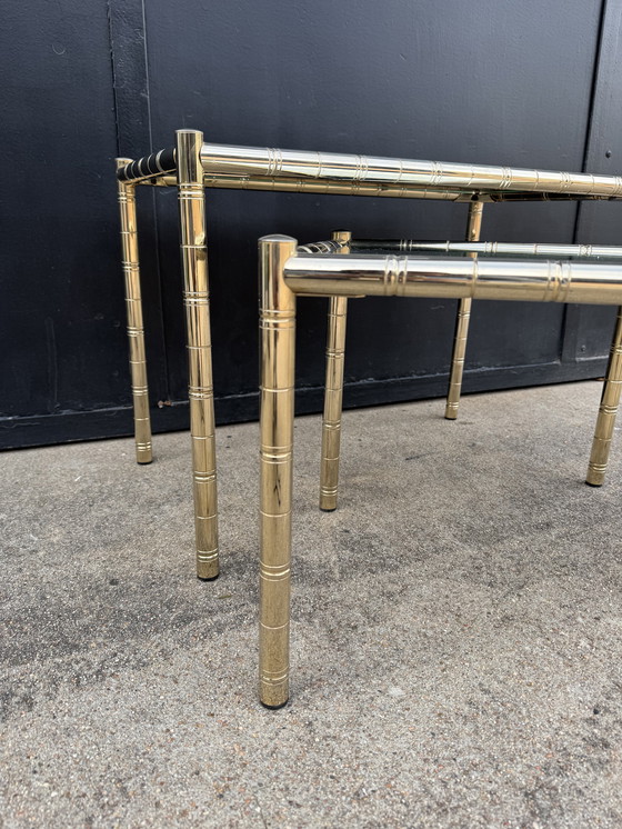 Image 1 of Nesting tables in gold-tone metal, bamboo, and mirror, 1970s style