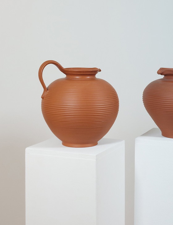 Image 1 of Pair of handmade vintage terracotta handled vases