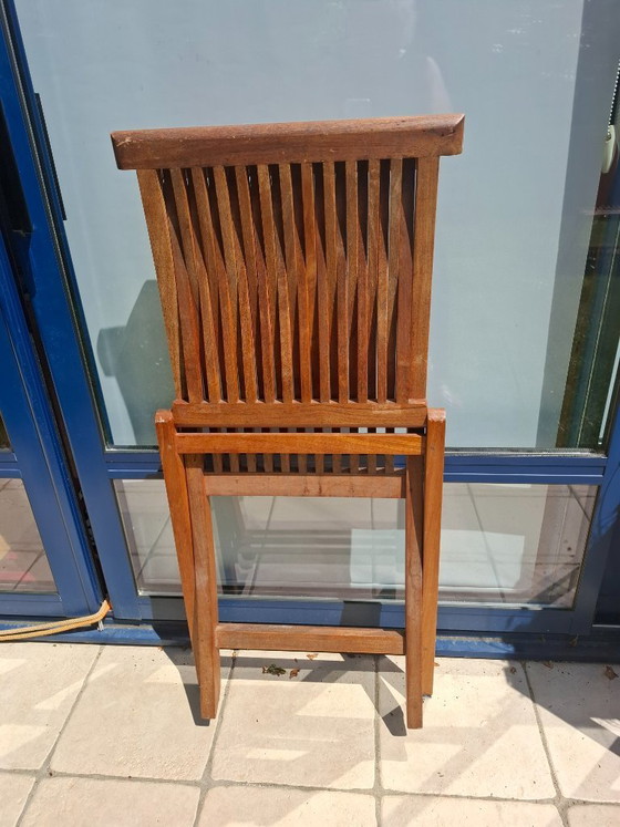Image 1 of Lot de 4 chaises de jardin pliantes en Teck massif + 4 coussins de chaises à dossier offerts