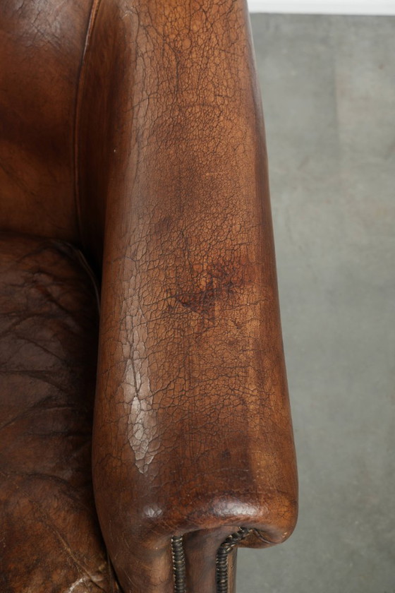 Image 1 of 2 fauteuils club vintage en peau de mouton, au look superbe et à l'assise confortable.
