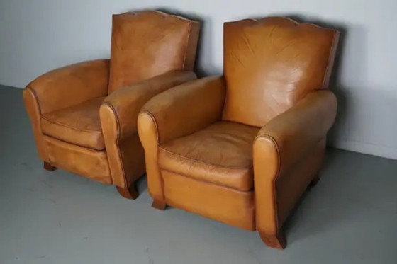 Image 1 of Set Franse cognackleurige leren clubfauteuils met ‘moustache’-rugleuning, jaren 1950