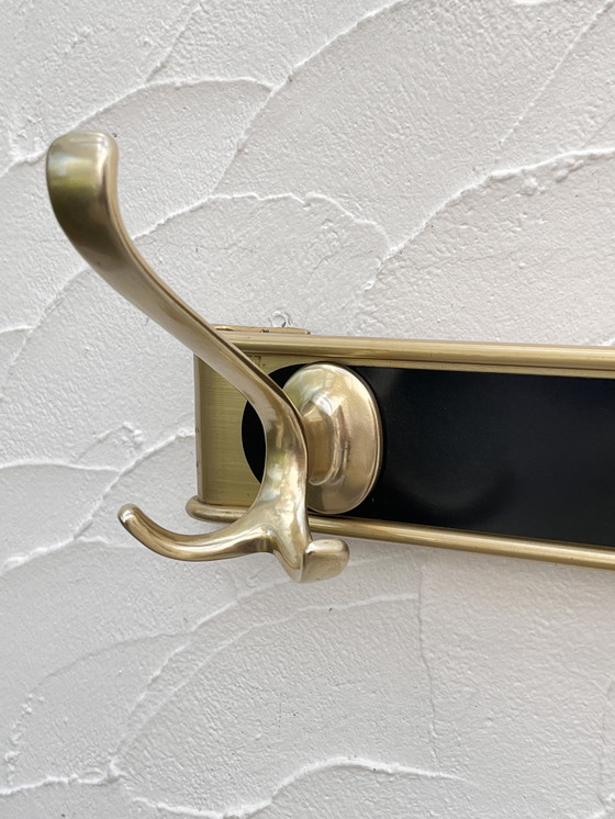 Image 1 of Kleiderständer aus goldfarbenem Aluminium