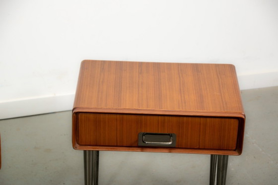 Image 1 of Comodini italiani in teak con dettagli in ottone. Circa 1970.