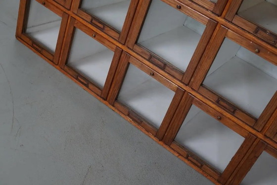 Image 1 of Antique large Dutch oak haberdashery cabinet with hinged doors, 1920s/30s
