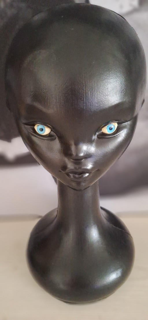 Testa di manichino vintage con occhi di vetro