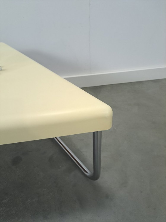 Image 1 of Space age triangular plastic table with chrome tubular frame legs