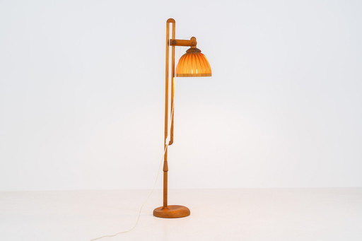 Sculptural pine floor lamp by Hans-Agne Jakobsson for Ellysett Markaryd (Sweden,1960s).