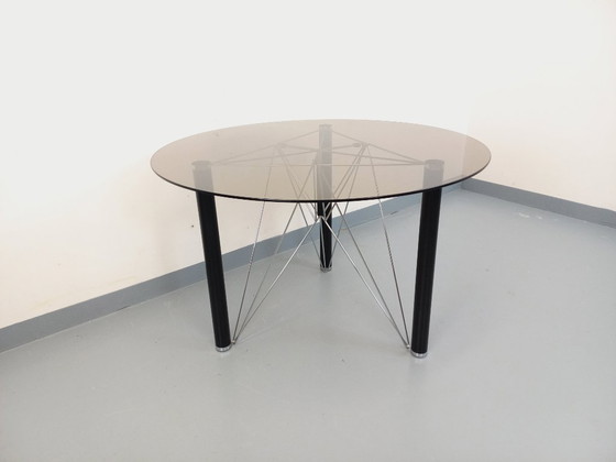 Image 1 of Vintage round dining table in smoked glass, black metal and chrome metal from the 80s