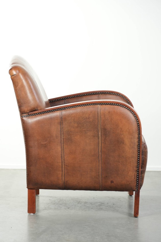 Image 1 of Beautiful sheepskin armchair in Art Deco style with wooden armrests