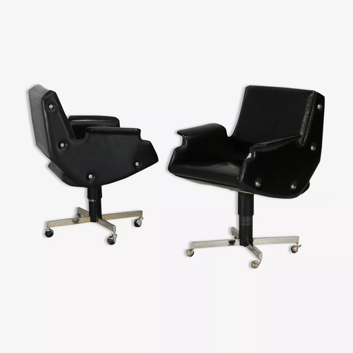 2 poltrone girevoli, similpelle e acciaio, Italia, circa 1960