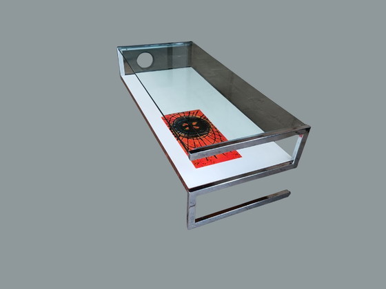 Image 1 of Mesa de centro Belarti con panel artístico de vidrio, cromo y cerámica.