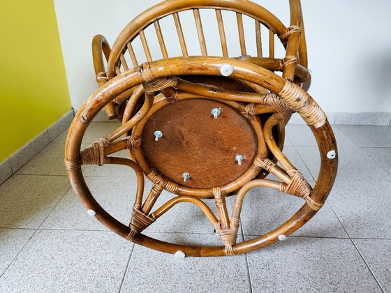 Image 1 of Poltrona girevole vintage in rattan
