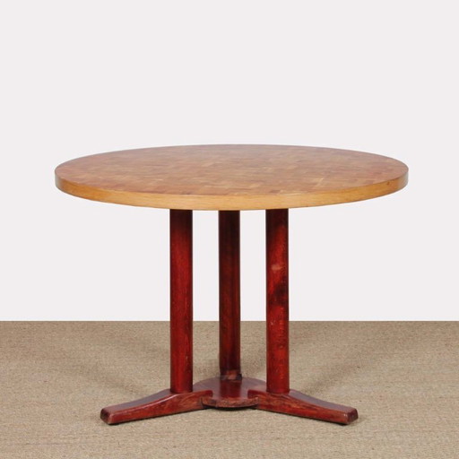 Round wooden standing dining table dating from the 1980s