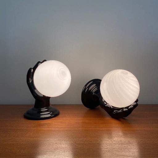 Pair of black ceramic hand-shaped wall sconces from the 70s and 80s