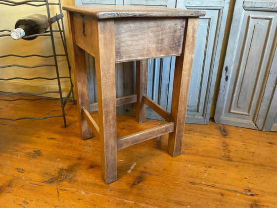 Image 1 of Mesa auxiliar con banco plegable y taburete en francés.