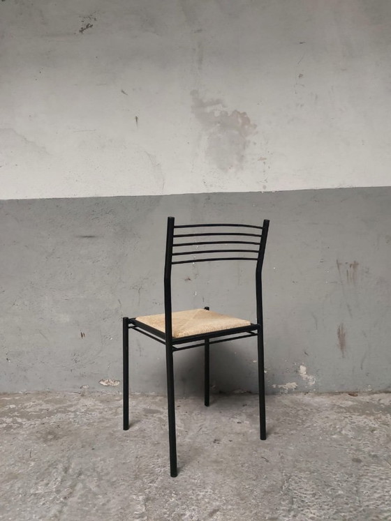 Image 1 of 4 chaises en métal avec assises en osier