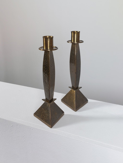 Pair of hand-forged hammered brass candlesticks, Menphis style